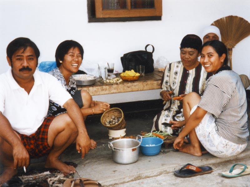 Brother, Eti, their Mom & Eti's Sister prepare food